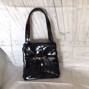 An air step black patent handbag